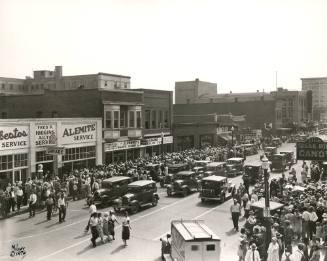 A crowd gathers for the grand opening of J. C. Penney's Department Store
