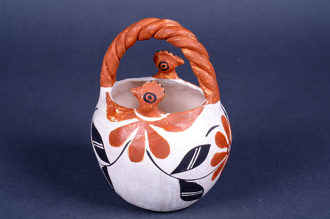 Acoma Pottery Basket with bird heads