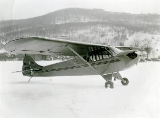 Taylor Cub Parked in the Snow