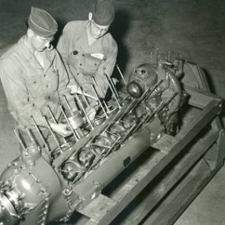 Privates Henry Meyer and Clyde Powell Rebuild an Allison Engine