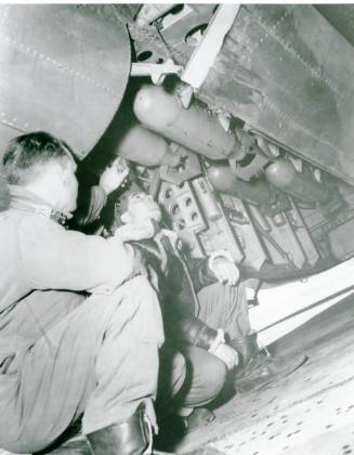 Inspecting an AT-11 Bombing Trainer