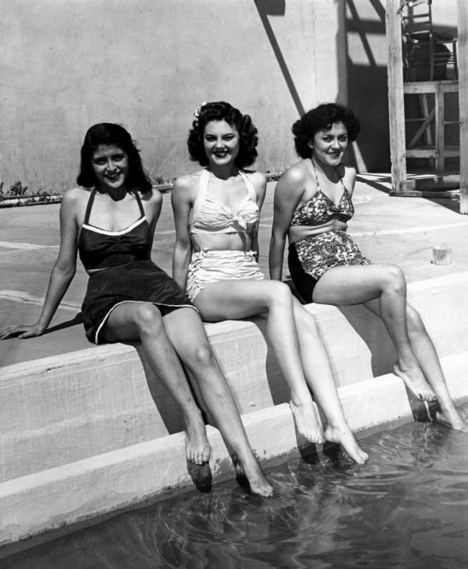 Three Young Women by Swimming Pool