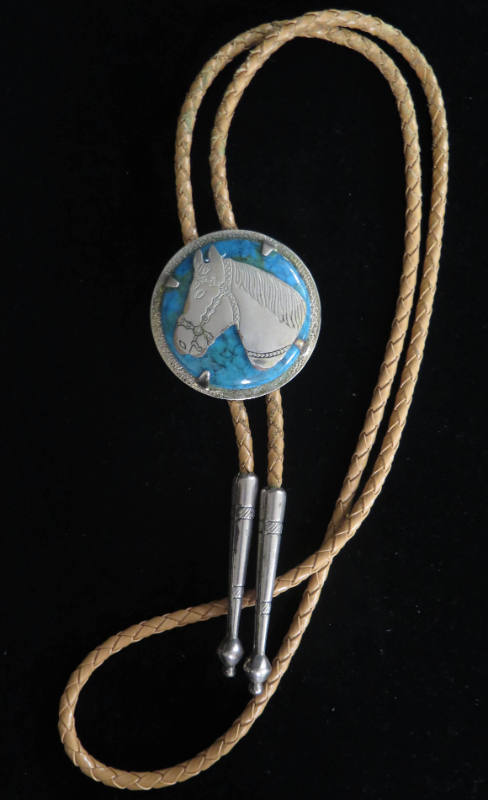 Horse silver overlay and turquoise bolo tie