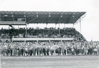 Fairgrounds grandstand with spectators