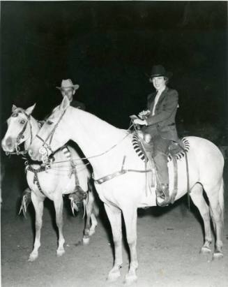 Mr. A. E. Wray and Mrs. Josephine McMahon on horseback