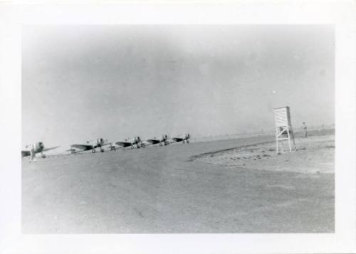 A line of Curtiss P-36 Pursuit Ships at Albuquerque Airport