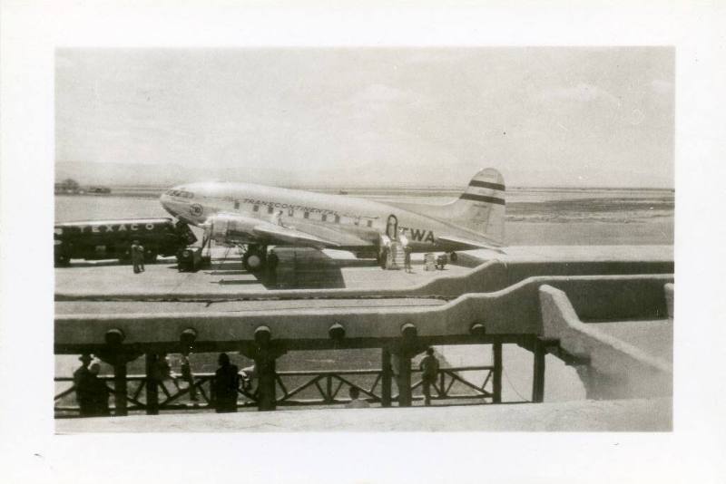 A DC-3 Trans World Airlines airplane on the tarmac at Albuquerque Airport