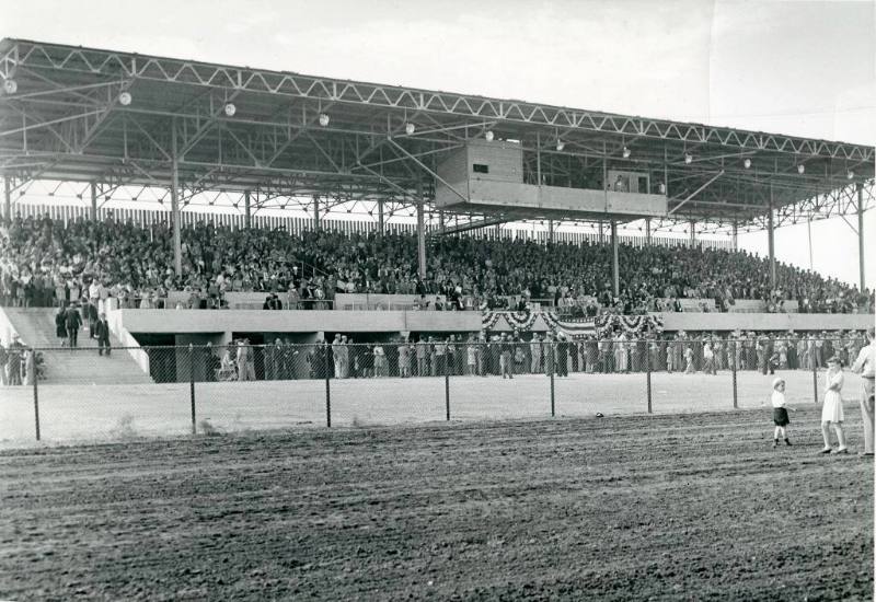 A view of the crowded State Fairgrounds Grandstand from the Race Track