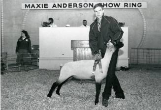 Champion lamb with an unidentified handler