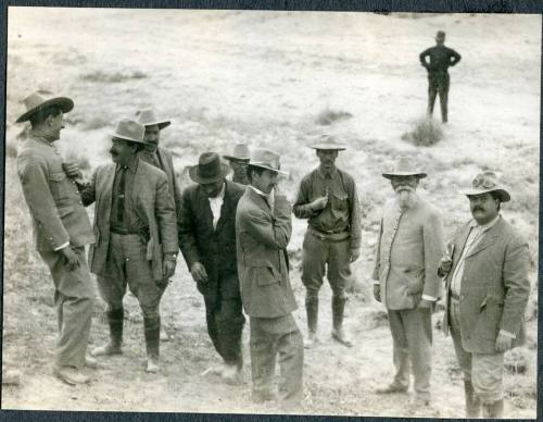General Carranza standing with a group of men