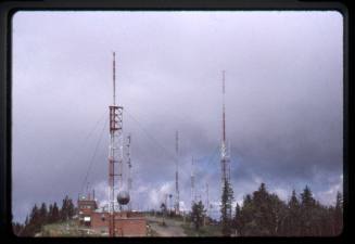 Radio towers and buildings at the crest of the Sandia Mountains