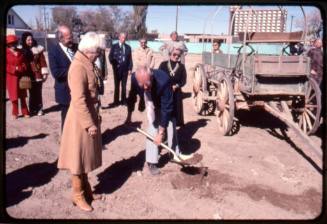 Albuquerque Museum Trustee, Dick Bice, uses a shovel at a groundbreaking