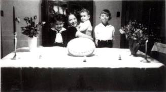 Children with a cake