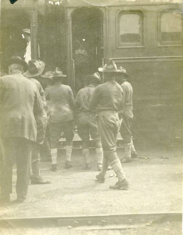 Soldiers boarding a passenger train at Albuquerque Depot
