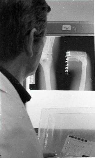Doctor Reading an X-ray