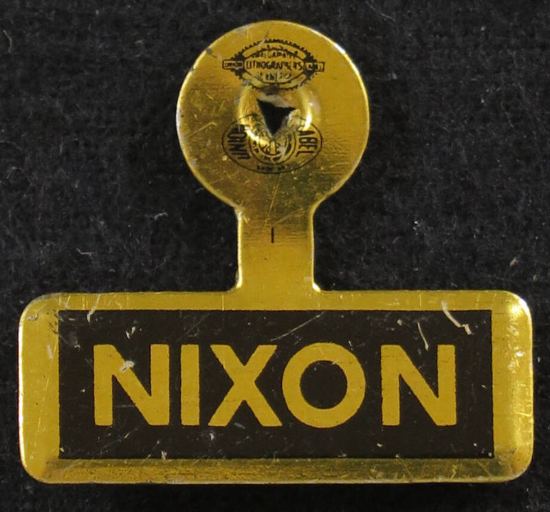 Nixon lapel pin