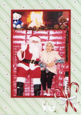 Fannie Lucero with Santa Claus