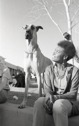 Young woman with a Great Dane