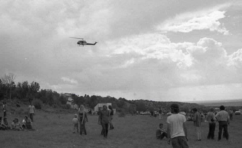 People in a field in Placitas, New Mexico