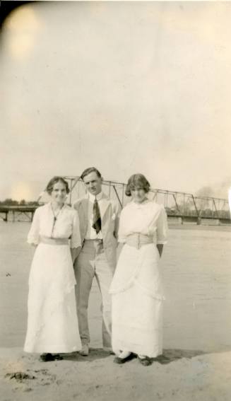 Three people at Barelas Bridge