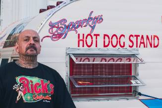 Sparky (Steven P. Gomez) with his hot dog stand