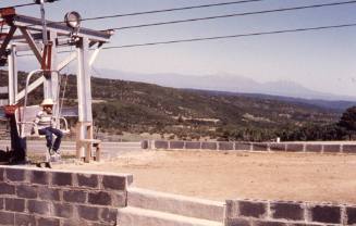 Boy sitting in chair lift at Raton Pass