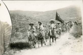 A column of soldiers in the Red Flag Brigade (Colorados) cavalry