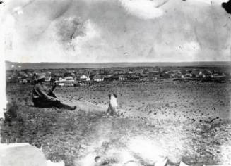 Man and Dog Overlooking New Town