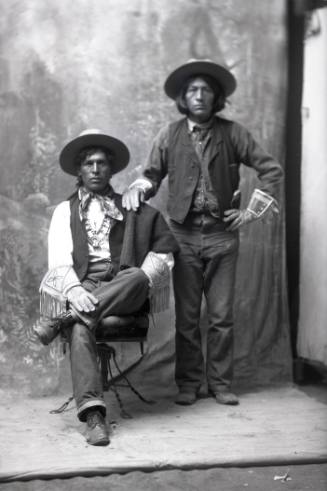 Studio Portrait of Two Cowboys