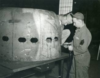 Riveting the Cowling of a Radial Engine