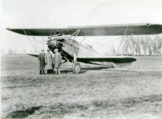 Three Men with a U.S. Mail Aircraft