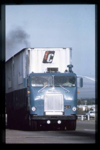 Eighteen-wheeler in traffic