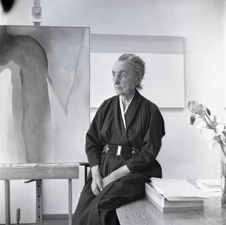 Georgia O'Keeffe with easel painting #8-A
