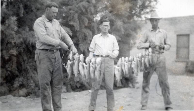 Men with a String of Fish