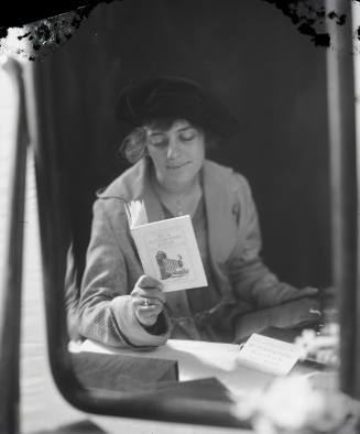 Daphne Cobb Reading a Kodak Manual